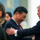 China’s President Xi Jinping, center, U.S. President Donald Trump and first lady Melania Trump attend a state dinner at the Great Hall of the People in Beijing, China, Thursday, Nov. 9, 2017.